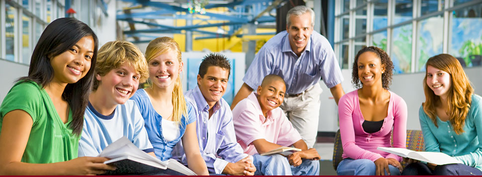 Photo of teacher and students
